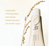 Woman applying Beauty of Joseon day care duo sunscreen for zero white cast dewy skin.