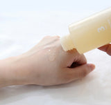 Dropper applying no 3 super glowing essence toner onto skin, highlighting the lightweight formula suitable for sensitive and acne-prone skin.