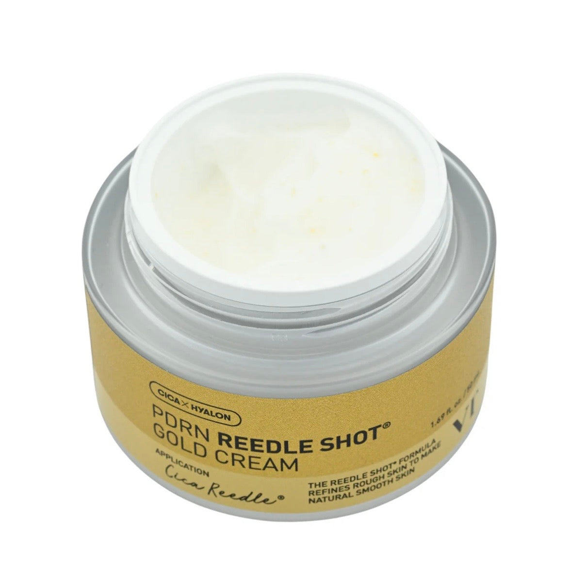 A pea-sized amount of the PDRN Reedle Shot Gold Cream on skin, showing the rich golden cream texture