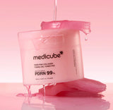 Gel-soaked texture of the Medicube PDRN pink collagen toning gel toner pad showing the unique Tencel material.