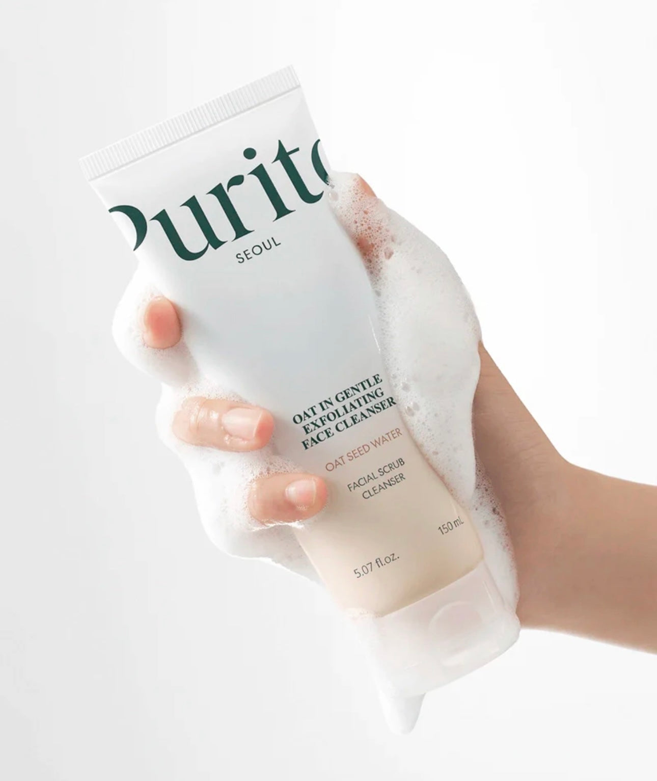 Outer box of Purito oat in gentle exfoliating cleanser 150ml, minimal beige design, cruelty-free and vegan logo visible.