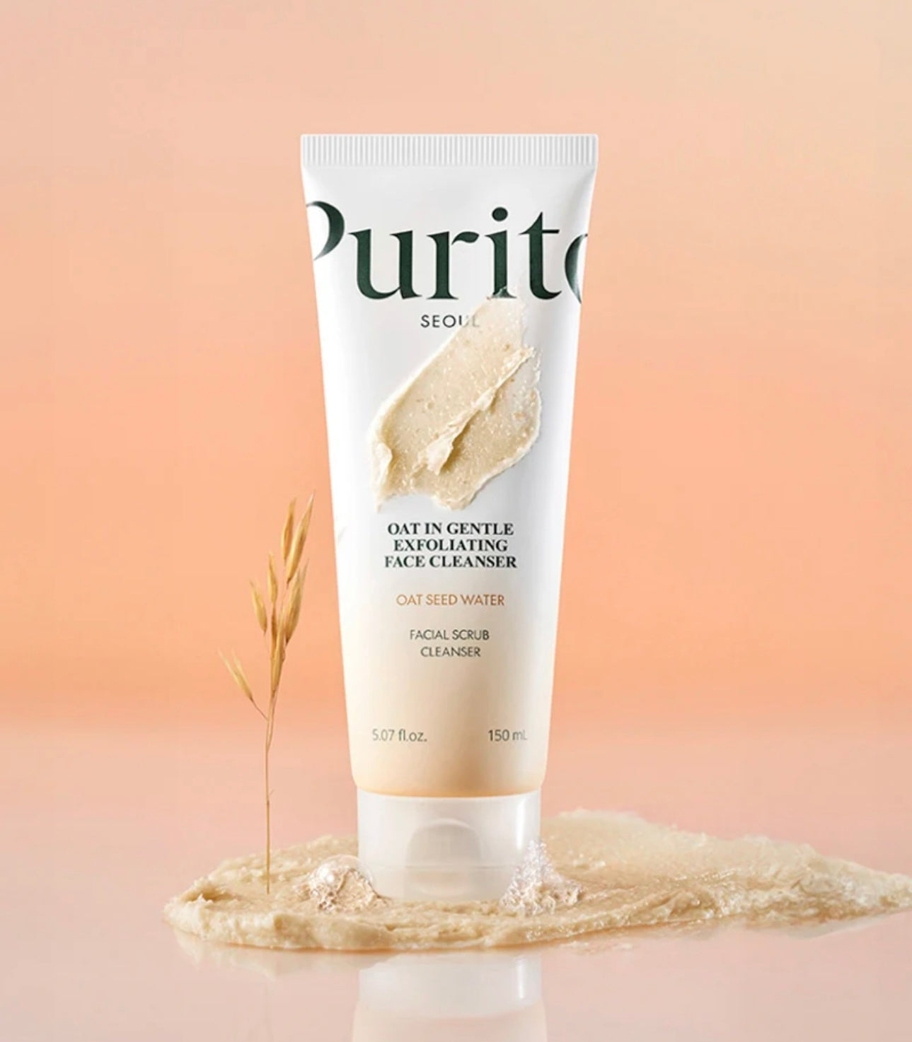 Purito Oat-in Gentle Exfoliating Face Cleanser 150ml bottle on white background, creamy label with oat illustration.