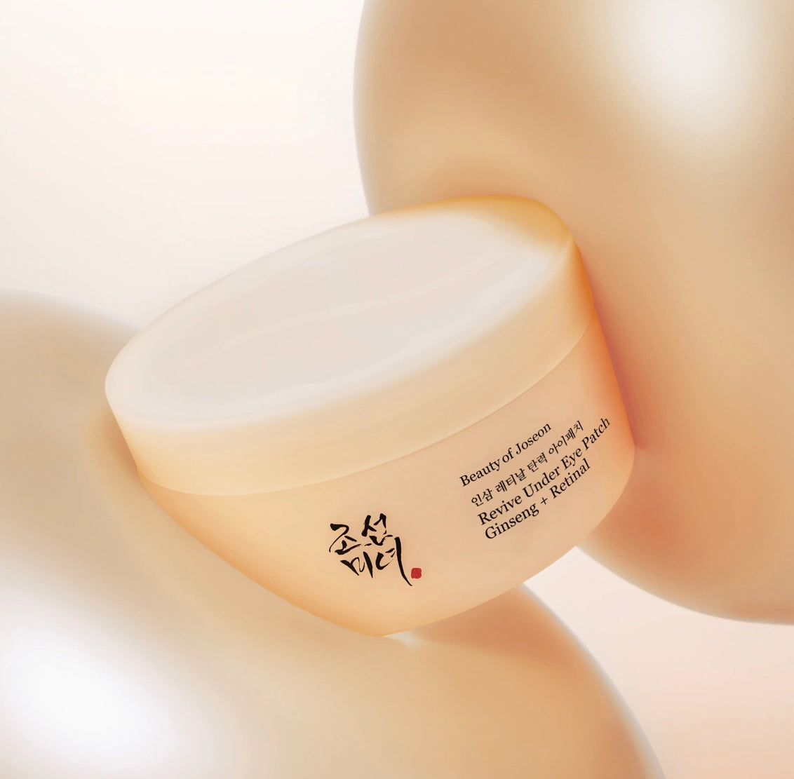 Close-up of the hydrogel Revive Under Eye Patch adhering smoothly to the under-eye area.