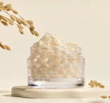 A close-up swatch showing the unique gel cream texture with visible rice ceramide capsules blending on the skin.
