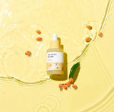 A person enjoying the soothing, non-sticky feel of the Round Lab Vita Niacinamide Serum.