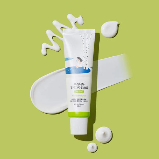 Applying Round Lab Sun Screen for daily UV protection