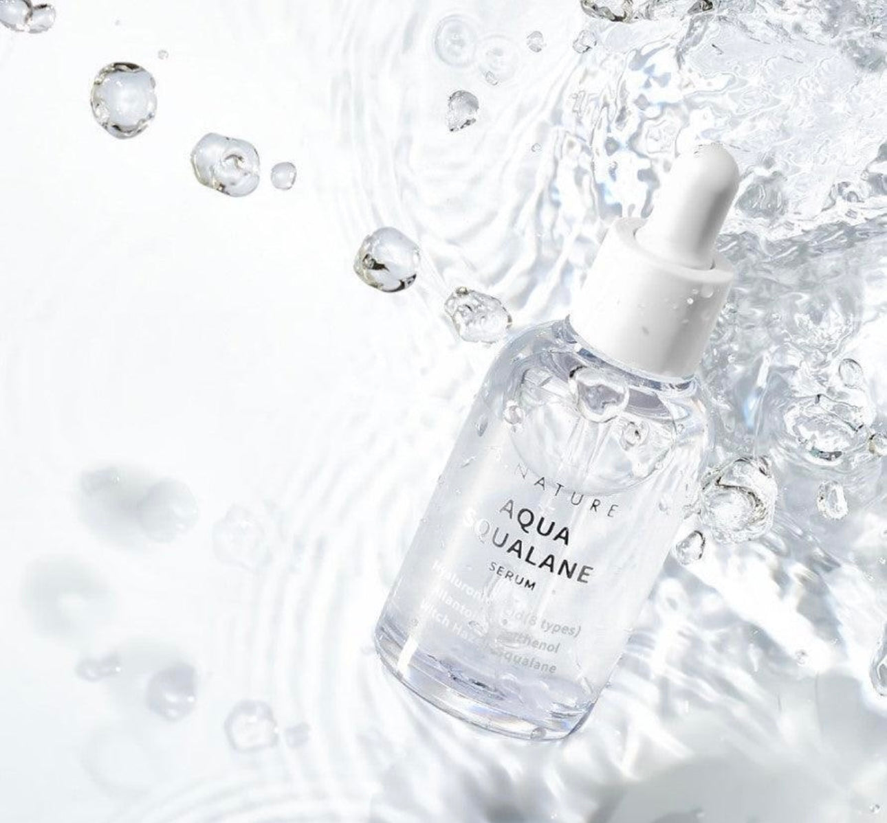 S.Nature Aqua Squalane Serum 50ml bottle against a minimalist background showcasing the hydrating serum packaging.