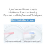 Close-up of the Soon Jung Toner's light, watery texture on fingertips.