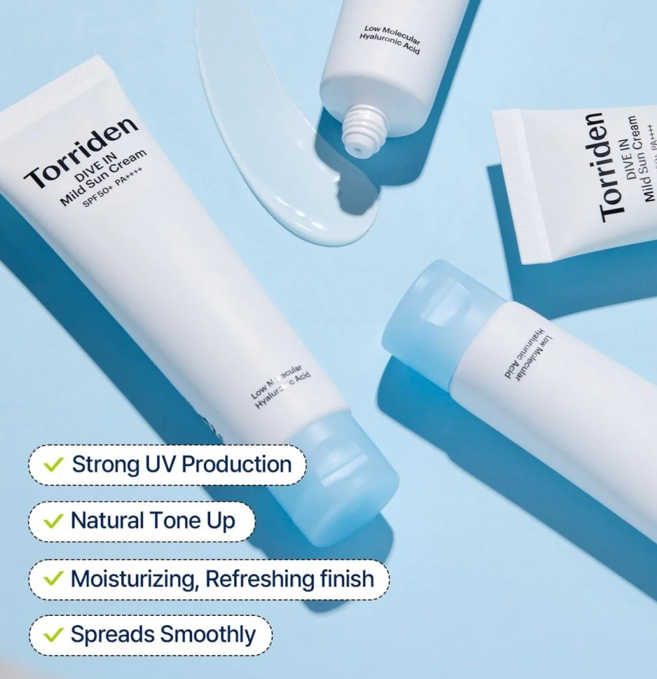 Close-up of Torriden Dive In Mild Suncream SPF50+ PA++++ texture spread on back of hand – smooth, no white cast.