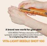 The pearlescent Vita Light Reedle Shot 100 serum beautifully dispensed on the back of a hand.